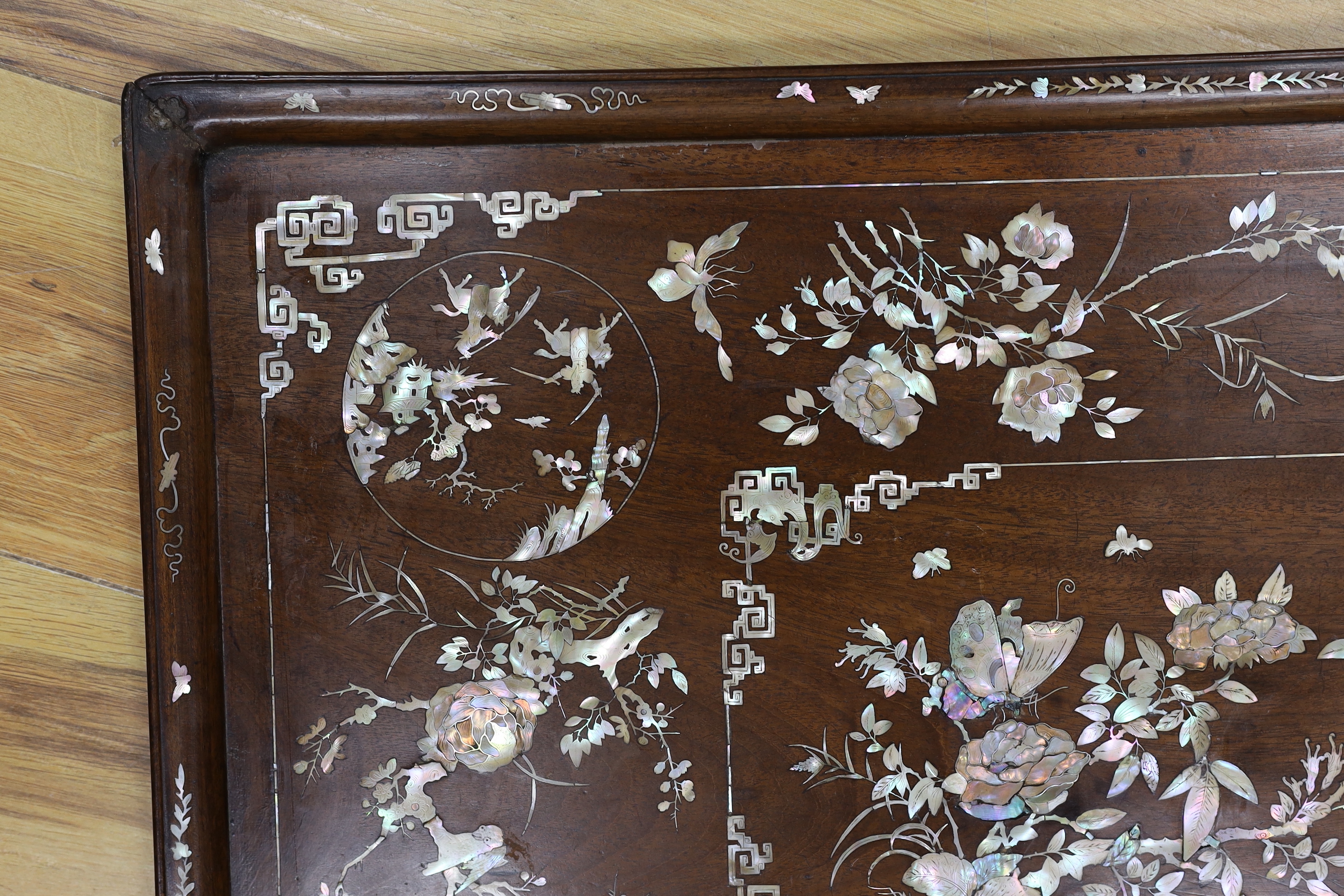 A Chinese mother of pearl inlaid hongmu tray, 47x70cm